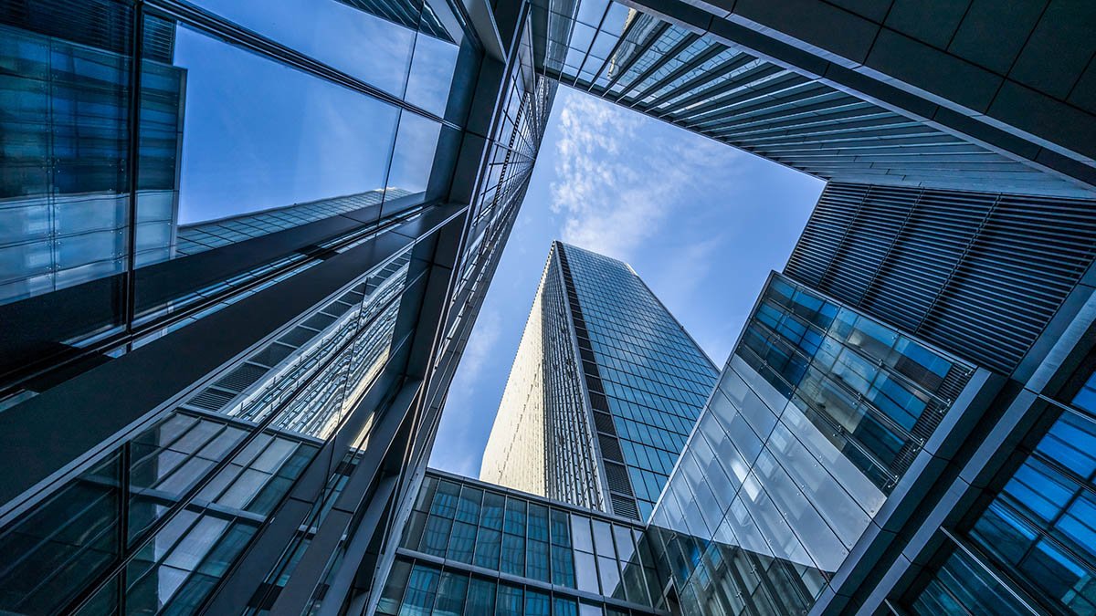Modern glass high-rise towers symbolising urban development